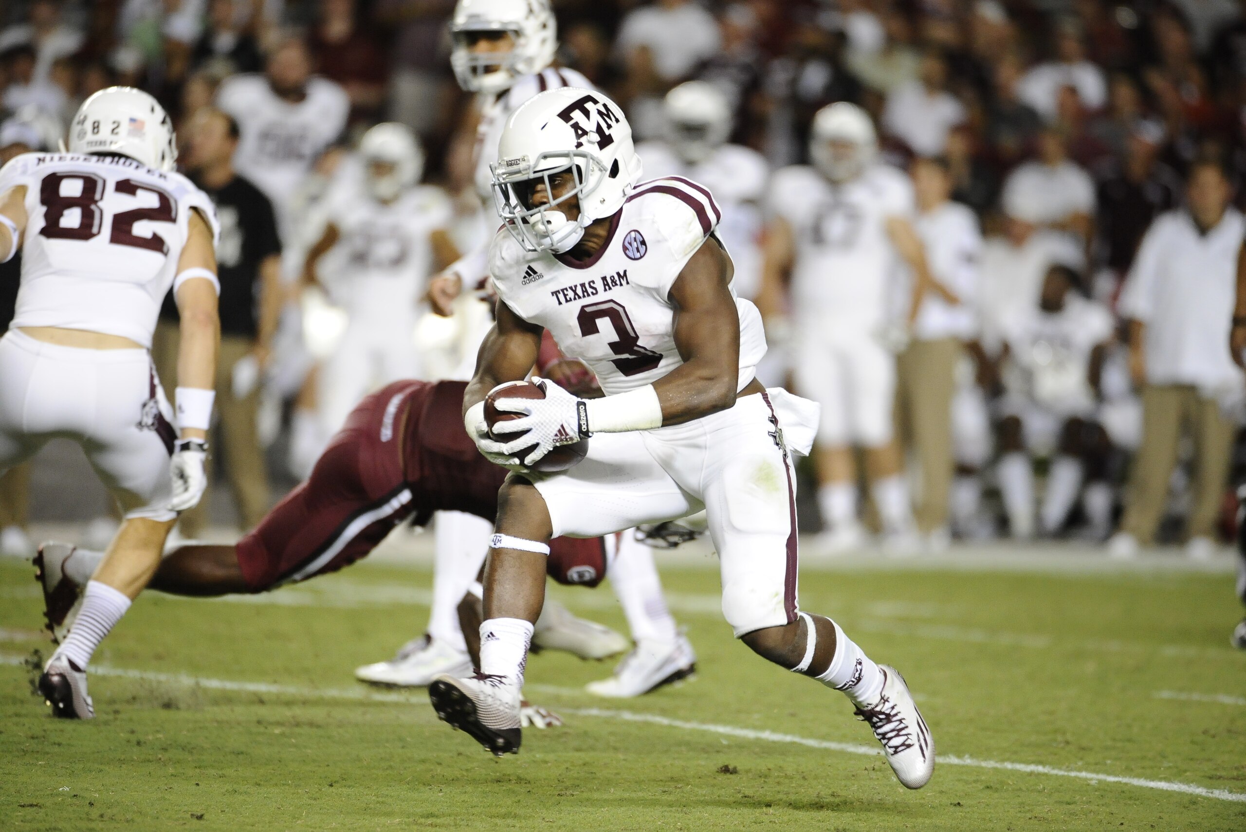 Texas A&M running back Trey Williams (3) runs against South Carolina during the second half of an NCAA college football game on Thursday, Aug. 28, 2014, in Columbia, S.C. Texas A&M won 52-28. (AP Photo/Rainier Ehrhardt)