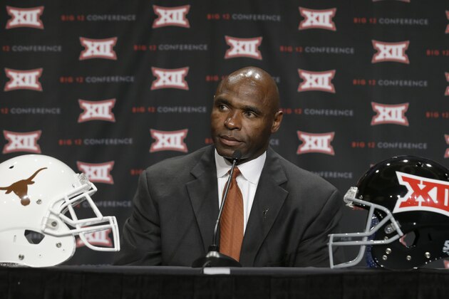 ADVANCE FOR WEEKEND EDITIONS, AUG. 15-17 - FILE - In this July 22, 2014 file photo, Texas head coach Charlie Strong listens to a question from a reporter during the Big 12 Conference NCAA college football media days in Dallas. If this was a man feeling the pressure of rebuilding the fallen behemoth of Longhorns football, there's no hint Strong is losing sleep at night or is even the least bit uncomfortable. (AP Photo, File)