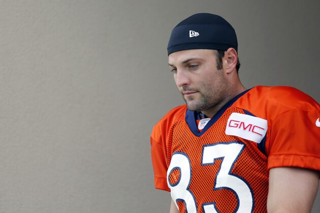 Denver Broncos'  Wes Welker takes to the field during NFL football training camp on Saturday, July 26, 2014, in Englewood, Colo. (AP Photo/Jack Dempsey)