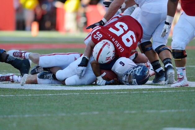 Aug 30, 2014; Lincoln, NE, USA; Florida Atlantic Owls quarterback Greg Hankerson (6) is sacked by Nebraska Cornhuskers defensive end Jack Gangwish (95) during the second half at Memorial Stadium. Nebraska won 55-7. Mandatory Credit: Denny Medley-USA TODAY Sports