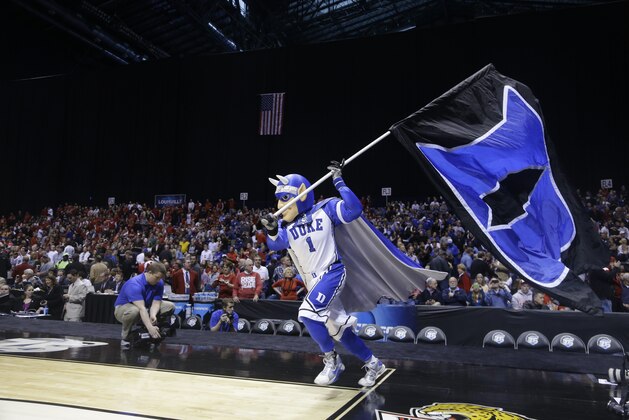 The Duke Blue Devils mascot runs on the court during a break in the first half of the Midwest Regional final against Louisville in the NCAA college basketball tournament, Sunday, March 31, 2013, in Indianapolis. (AP Photo/Michael Conroy) The Duke Blue Devils mascot runs on the court during a break in the first half of the Midwest Regional final against Louisville in the NCAA college basketball tournament, Sunday, March 31, 2013, in Indianapolis. (AP Photo/Michael Conroy)