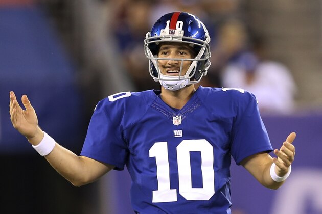 New York Giants quarterback Eli Manning reacts during the first half of an NFL preseason football game against the New England Patriots, Thursday, Aug. 28, 2014, in East Rutherford, N.J. (AP Photo/John Minchillo)
