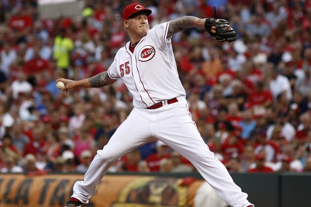 Cincinnati Reds starting pitcher Mat Latos throws against the Cleveland Indians in the fourth inning of a baseball game, Wednesday, Aug. 6, 2014, in Cincinnati. (AP Photo/David Kohl)