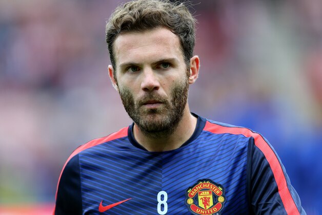 Manchester United's Juan Mata ahead of  their English Premier League soccer match against Sunderland at the Stadium of Light, Sunderland, England, Sunday, Aug. 24, 2014. (AP Photo/Scott Heppell)