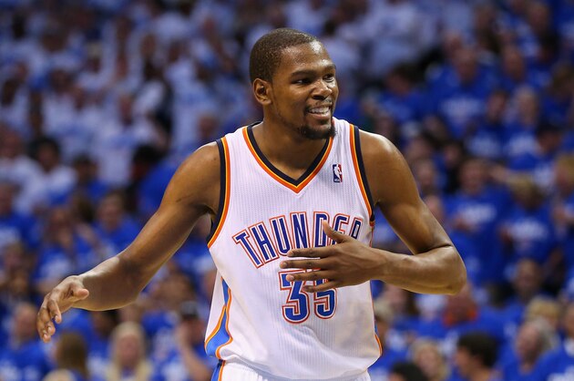 OKLAHOMA CITY, OK - MAY 27: Kevin Durant #35 of the Oklahoma City Thunder reacts to a play in the third quarter against the San Antonio Spurs during Game Four of the Western Conference Finals of the 2014 NBA Playoffs at Chesapeake Energy Arena on May 27, 2014 in Oklahoma City, Oklahoma. NOTE TO USER: User expressly acknowledges and agrees that, by downloading and or using this photograph, User is consenting to the terms and conditions of the Getty Images License Agreement.  (Photo by Ronald Martinez/Getty Images)