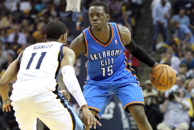 Apr 26, 2014; Memphis, TN, USA; Oklahoma City Thunder guard Reggie Jackson (15) drives against Memphis Grizzlies guard Mike Conley (11) during game four of the first round of the 2014 NBA Playoffs at FedExForum. Thunder defeated the Grizzlies 92-89. Mandatory Credit: Nelson Chenault-USA TODAY Sports