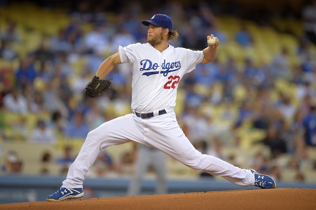 Los Angeles Dodgers starting pitcher Clayton Kershaw throws to the plate during the first inning of a baseball game against the San Diego Padres, Thursday, Aug. 21, 2014, in Los Angeles. (AP Photo/Mark J. Terrill)