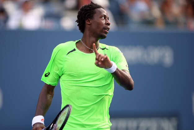 Sep 2, 2014; New York, NY, USA; Gael Monfils (FRA) challenges a line call during his match against Grigor Dimitrov (BUL) on day nine of the 2014 U.S. Open tennis tournament at USTA Billie Jean King National Tennis Center. Mandatory Credit: Jerry Lai-USA TODAY Sports