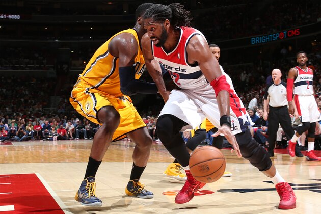 WASHINGTON, DC - MAY 11: Nene #42 of the Washington Wizards handles the ball against the Indiana Pacers in Game Four of the Eastern Conference Semifinals at Verizon Center on May 11, 2014 in Washington, DC. NOTE TO USER: User expressly acknowledges and agrees that, by downloading and or using this photograph, User is consenting to the terms and conditions of the Getty Images License Agreement. Mandatory Copyright Notice: Copyright 2014 NBAE  (Photo by Ned Dishman /NBAE via Getty Images)