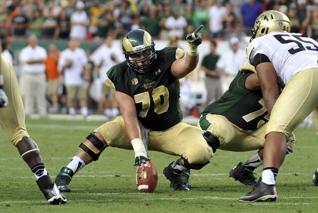 Colorado State Rams offensive linesman Weston Richburg (70) lines up against Colorado during the second half of an NCAA college football game Sunday Sept. 1, 2013, in Denver. Colorado beat Colorado State 41-27 to win the Rocky Mountain Showdown.(AP Photo/Jack Dempsey)