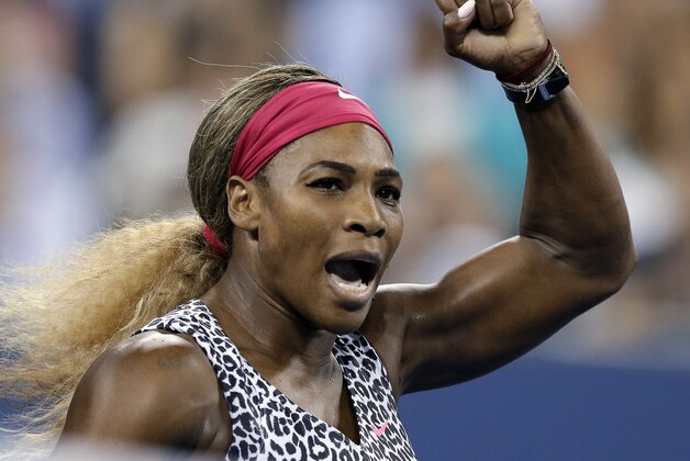 Serena Williams, of the United States, gestures after defeating Flavia Pennetta, of Italy, 6-3, 6-2 in the quarterfinals of the U.S. Open tennis tournament Wednesday, Sept. 3, 2014, in New York. (AP Photo/Darron Cummings)
