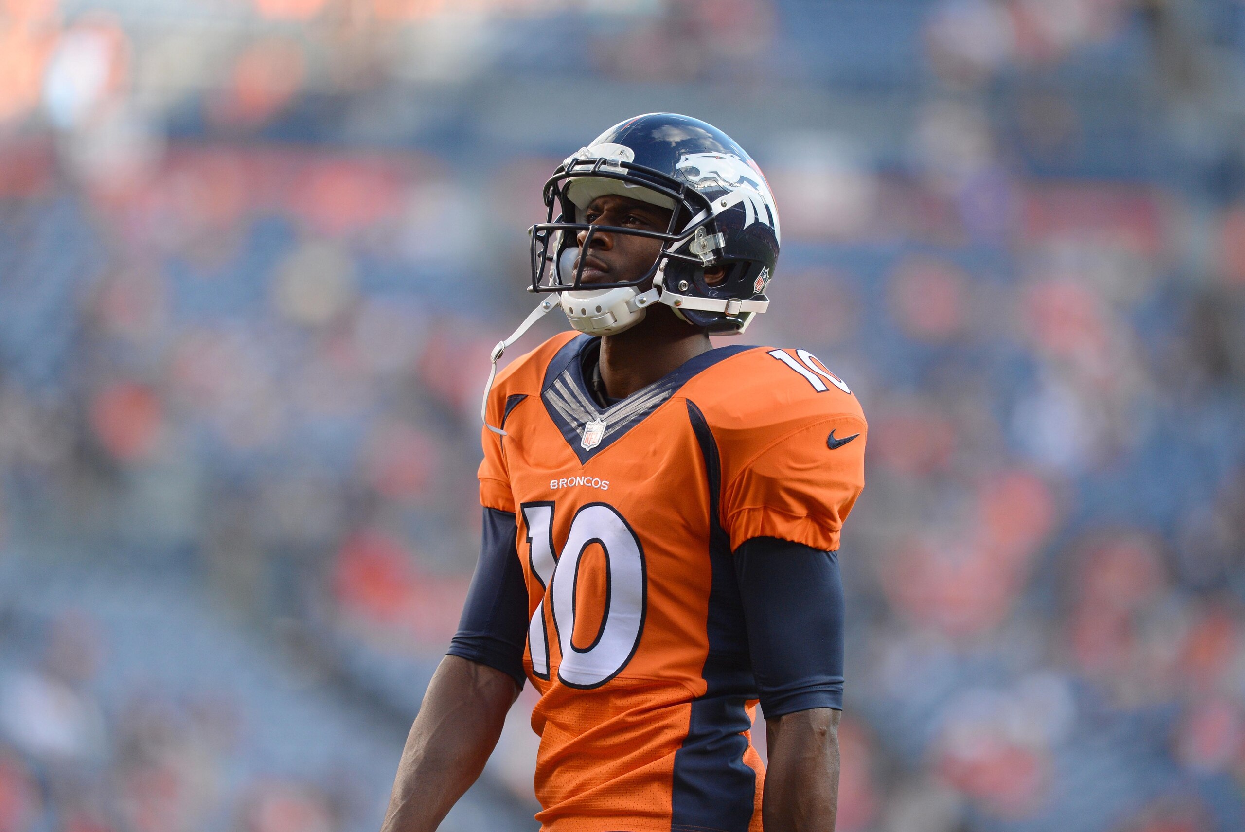 Aug 23, 2014; Denver, CO, USA; Denver Broncos wide receiver Emmanuel Sanders (10) before the start of a preseason game against the Houston Texans at Sports Authority Field at Mile High. Mandatory Credit: Ron Chenoy-USA TODAY Sports