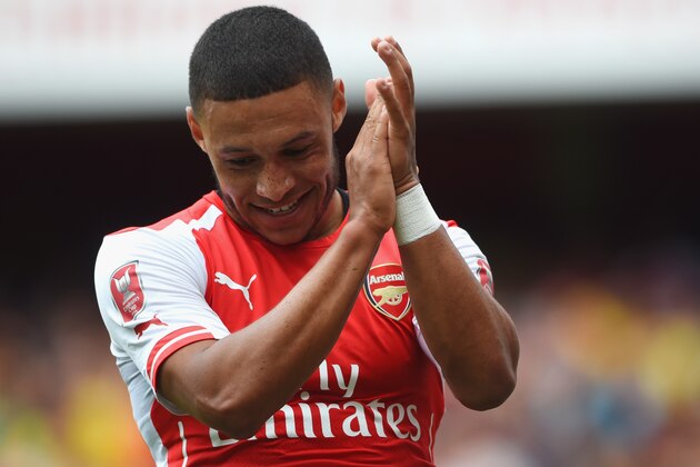 LONDON, ENGLAND - AUGUST 02: Alex Oxlade-Chamberlain looks on during the Emirates Cup match between Arsenal and Benfica at the Emirates Stadium on August 2, 2014 in London, England.  (Photo by Michael Regan/Getty Images)