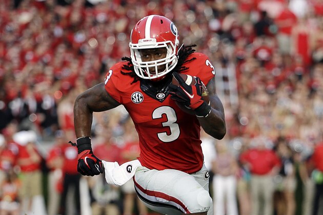 Georgia's Todd Gurley runs the ball in the first half of an NCAA college football game against Clemson, Saturday, Aug. 30, 2014, in Athens, Ga. (AP Photo/David Goldman)