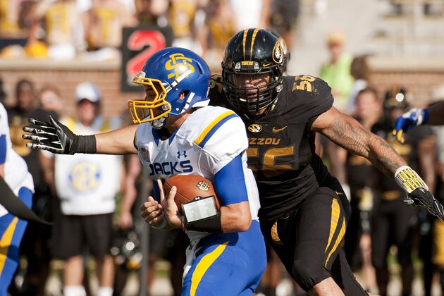 South Dakota State quarterback Jacob Menage, left, is sacked by Missouri's Shane Ray during the third quarter of an NCAA college football game Saturday, Aug. 30, 2014, in Columbia, Mo. (AP Photo/L.G. Patterson)