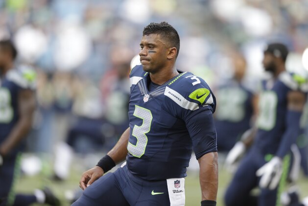Seattle Seahawks' Russell Wilson warms up before a preseason NFL football game against the Chicago Bears, Friday, Aug. 22, 2014, in Seattle. (AP Photo/John Froschauer) Seattle Seahawks' Russell Wilson warms up before a preseason NFL football game against the Chicago Bears, Friday, Aug. 22, 2014, in Seattle. (AP Photo/John Froschauer)