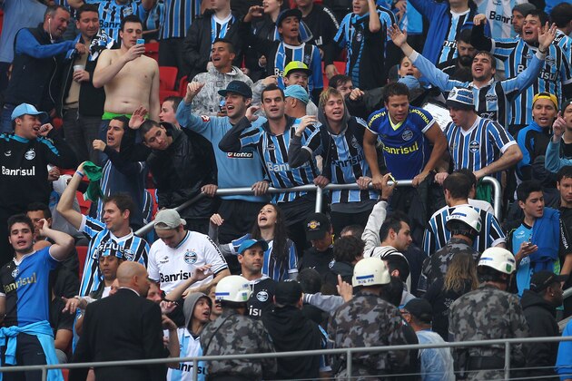 PORTO ALEGRE, BRAZIL - AUGUST 10: Gremio fans before the match between Internacional and Gremio as part of Brasileirao Series A 2014, at Estadio Beira-Rio on August 10, 2014, in Porto Alegre, Brazil. (Photo by Lucas Uebel/Getty Images)