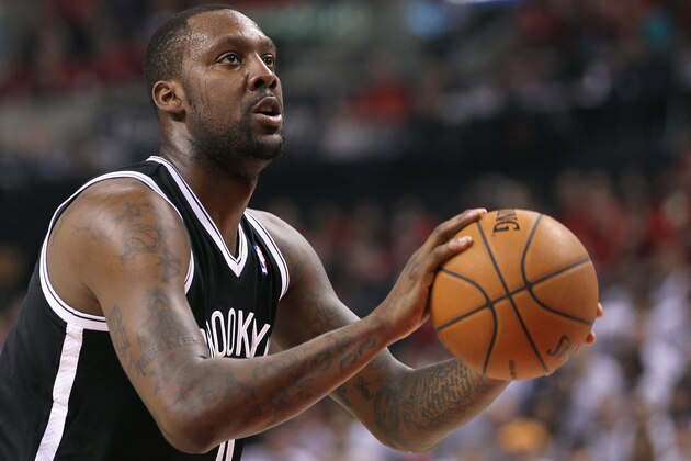 TORONTO, ON - MAY 4:  Andray Blatche #0 of the Brooklyn Nets gets set to take a free throw against the Toronto Raptors in Game Seven of the NBA Eastern Conference Quarterfinals at the Air Canada Centre on May 4, 2014 in Toronto, Ontario, Canada. The Nets defeated the Raptors 104-103 to win the series 4-3. NOTE TO USER:  user expressly acknowledges and agrees that, by downloading and/or using this Photograph, user is consenting to the terms and conditions of the Getty Images License Agreement. (Photo by Claus Andersen/Getty Images)