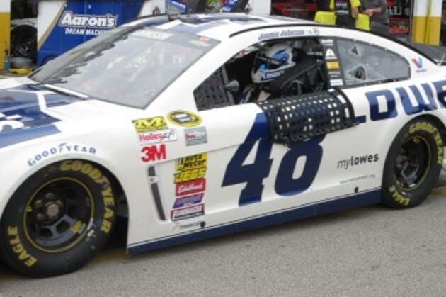 Jimmie Johnson pulls into the Daytona garage after a practice run.