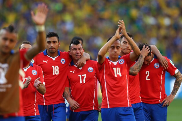 BELO HORIZONTE, BRAZIL - JUNE 28: (L-R) Gonzalo Jara, Gary Medell, Fabian Orellana, Eduardo Vargas and Eugenio Mena of Chile react after being defeated by Brazil in a penalty shootout during the 2014 FIFA World Cup Brazil round of 16 match between Brazil and Chile at Estadio Mineirao on June 28, 2014 in Belo Horizonte, Brazil.  (Photo by Quinn Rooney/Getty Images)