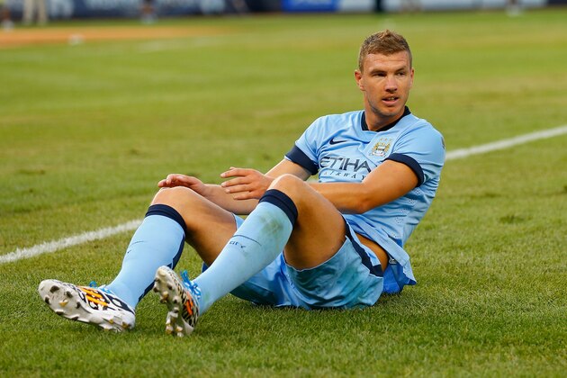 NEW YORK, NY - JULY 30:  Edin Dzeko #10 of Manchester City in action against Liverpool during the International Champions Cup 2014 at Yankee Stadium on July 30, 2014 in the Bronx borough of New York City.  (Photo by Mike Stobe/Getty Images)