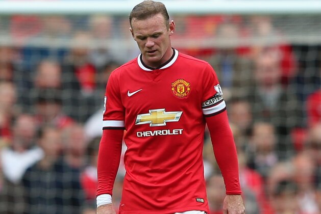 MANCHESTER, ENGLAND - AUGUST 16: Wayne Rooney of Manchester United looks on during the Barclays Premier League match between Manchester United and Swansea City at Old Trafford on August 16, 2014 in Manchester, England. (Photo by Alex Livesey/Getty Images) MANCHESTER, ENGLAND - AUGUST 16: Wayne Rooney of Manchester United looks on during the Barclays Premier League match between Manchester United and Swansea City at Old Trafford on August 16, 2014 in Manchester, England. (Photo by Alex Livesey/Getty Images)