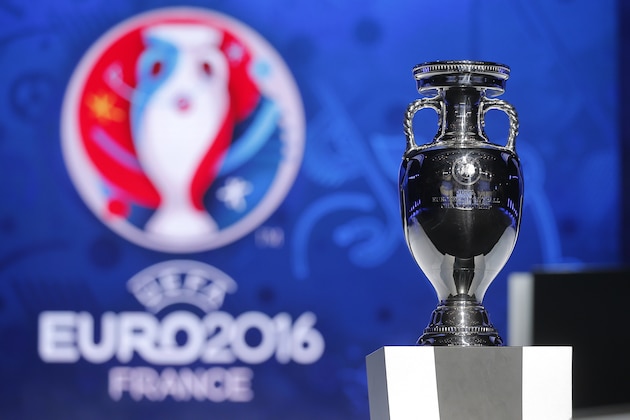 The UEFA EURO 2016 trophy is displayed during the qualifying draw ceremony at the Acropolis Convention Centre in Nice, southeastern France, Sunday, Feb 23, 2014.  (AP Photo/Lionel Cironneau)