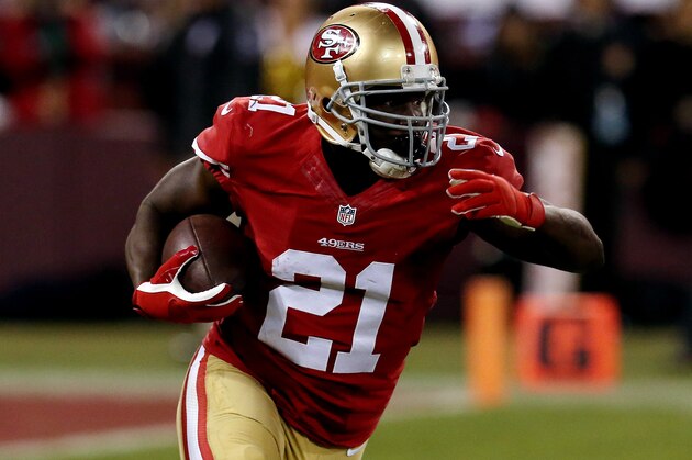 SAN FRANCISCO, CA - DECEMBER 23:  Running back Frank Gore #21 of the San Francisco 49ers carries the ball against the Atlanta Falcons during a game at Candlestick Park on December 23, 2013 in San Francisco, California.  (Photo by Stephen Dunn/Getty Images)