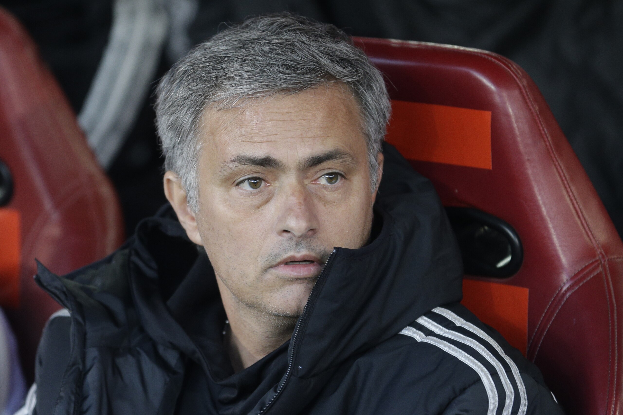 Chelsea's manager Jose Mourinho waits for the start of Champions League semifinal first leg, soccer match between Atletico Madrid and Chelsea at the Vicente Calderon stadium in Madrid, Spain, Tuesday, April 22, 2014 .(AP Photo/Paul White)