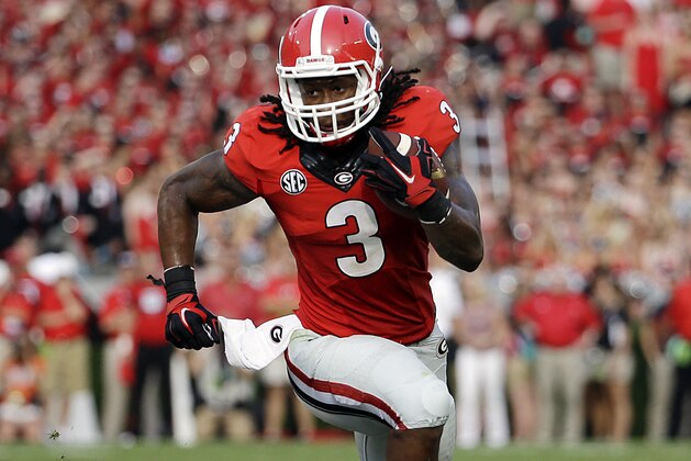 Georgia's Todd Gurley runs the ball in the first half of an NCAA college football game against Clemson, Saturday, Aug. 30, 2014, in Athens, Ga. (AP Photo/David Goldman)