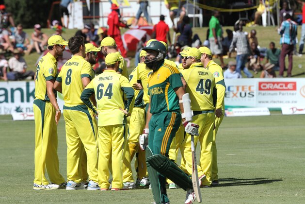 South African batsman  Hashim Amla walks off the pitch after been dismissed during the  cricket One Day International against Australia in  Harare Zimbabwe Tuesday, Sept. 2, 2014.(AP Photo/Tsvangirayi Mukwazhi)