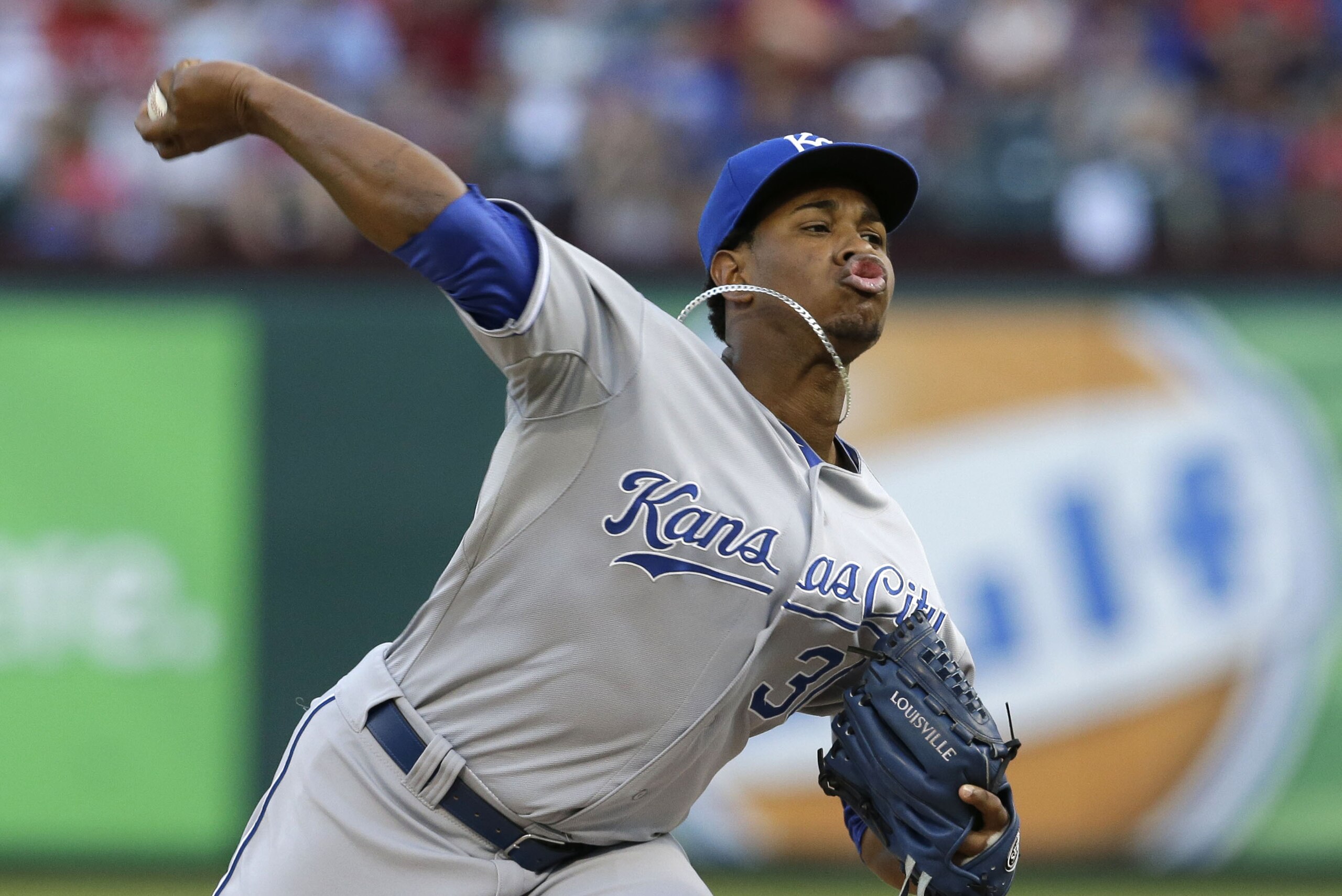 Kansas City Royals starting pitcher Yordano Ventura  throws during the first inning of a baseball game against the Texas Rangers Friday, Aug. 22, 2014, in Arlington, Texas. (AP Photo/LM Otero)