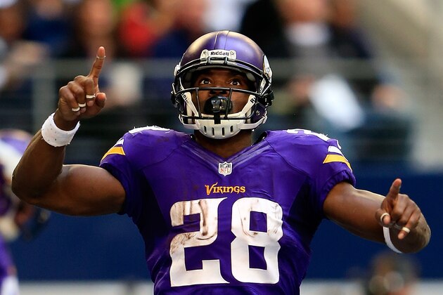 ARLINGTON, TX - NOVEMBER 03:  Running back Adrian Peterson #28 of the Minnesota Vikings celebrates after a touchdown during the game against the Dallas Cowboys at Cowboys Stadium on November 3, 2013 in Arlington, Texas.  (Photo by Jamie Squire/Getty Images)