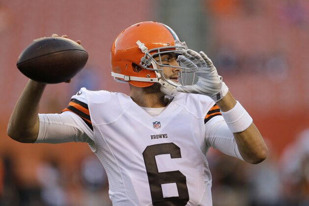 Cleveland Browns quarterback Brian Hoyer warms up before a preseason NFL football game against the Chicago Bears Thursday, Aug. 28, 2014, in Cleveland. (AP Photo/Tony Dejak)