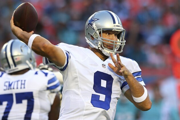 MIAMI GARDENS, FL - AUGUST 23: Tony Romo #9 of the Dallas Cowboys throws in the first quarter during a preseason game against the Miami Dolphins at Sun Life Stadium on August 23, 2014 in Miami Gardens, Florida.  (Photo by Mike Ehrmann/Getty Images)