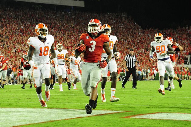 ATHENS, GA - AUGUST 30:  Todd Gurley #3 of the Georgia Bulldogs carries the ball for a fourth-quarter touchdown against the Clemson Tigers at Sanford Stadium on August 30, 2014 in Athens, Georgia. (Photo by Scott Cunningham/Getty Images)