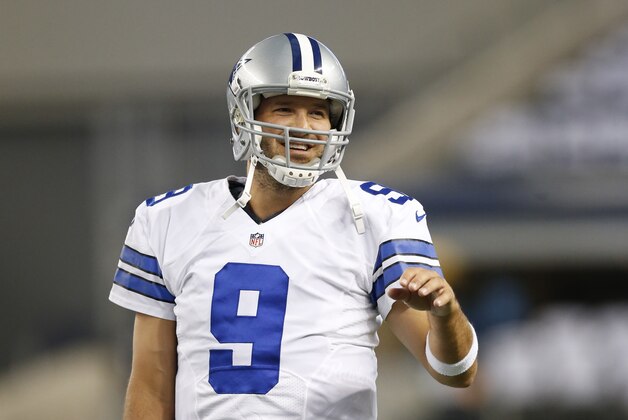 Aug 16, 2014; Arlington, TX, USA; Dallas Cowboys quarterback Tony Romo (9) throws prior to the game against the Baltimore Ravens at AT&T Stadium. Mandatory Credit: Matthew Emmons-USA TODAY Sports