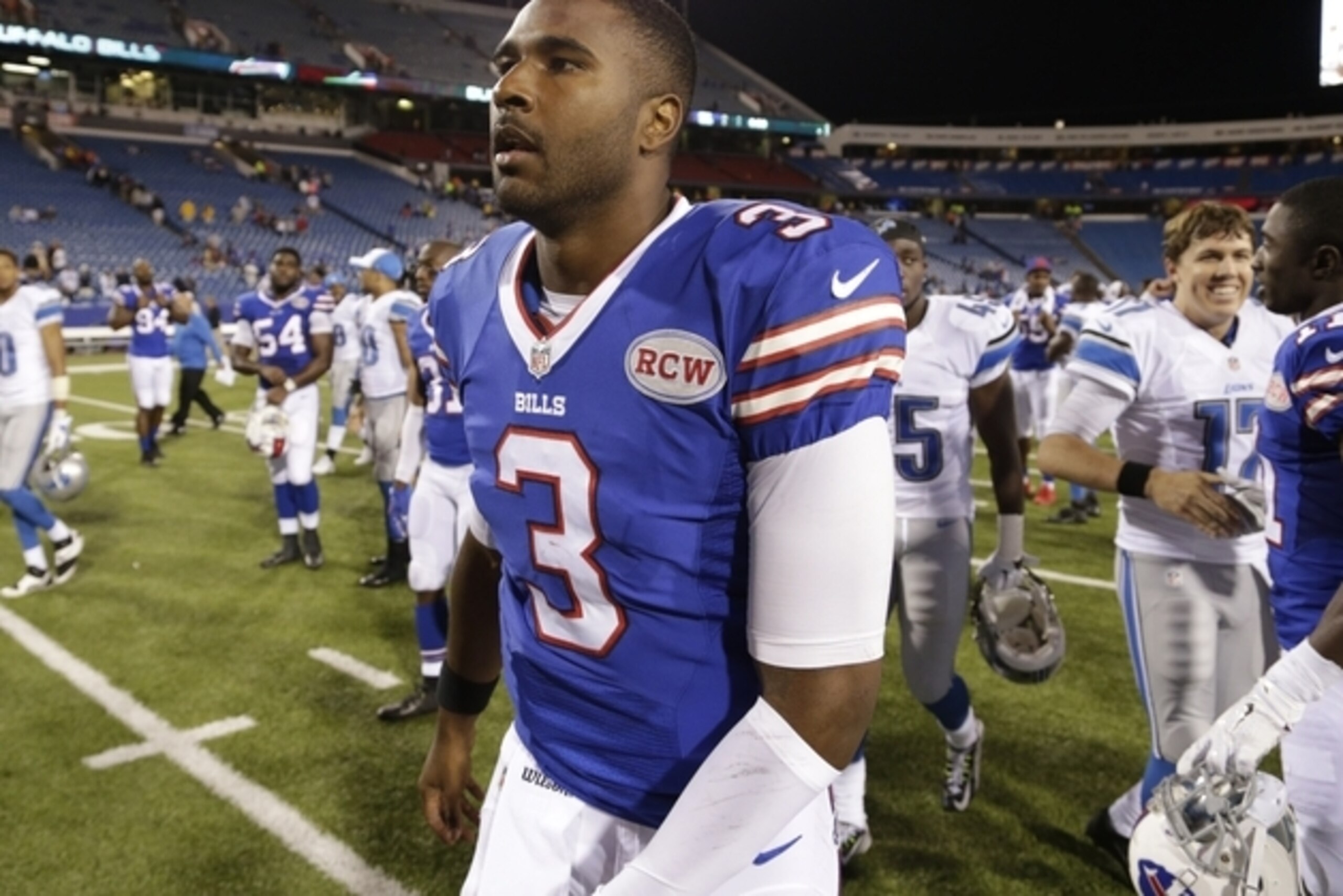 Buffalo Bills quarterback EJ Manuel (3) walks off the field after a loss to the Detroit Lions in a preseason NFL football game, Thursday, Aug. 28, 2014, in Orchard Park, N.Y. (AP Photo/Bill Wippert)