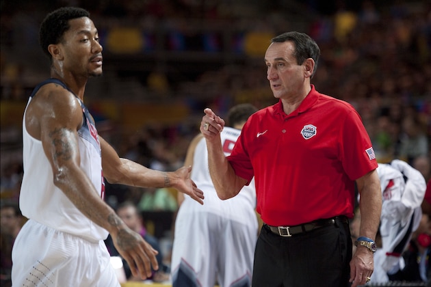 Unites States's coach Mike Krzyzewski, gives instructions beside US player Derrick Rose, during the Group C Basketball World Cup match between United States and New Zealand, in Bilbao northern Spain, Tuesday, Sept. 2, 2014. The 2014 Basketball World Cup competition take place in various cities in Spain from Aug. 30 through to Sept. 14.  United States won 98-71. (AP Photo/Alvaro Barrientos)