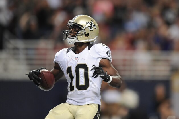 New Orleans Saints wide receiver Brandin Cooks (10) scores a touchdown on a 25-yard pass reception in the third quarter of a preseason NFL football game against the St. Louis Rams Friday, Aug. 8, 2014, in St. Louis. (AP Photo/L.G. Patterson)