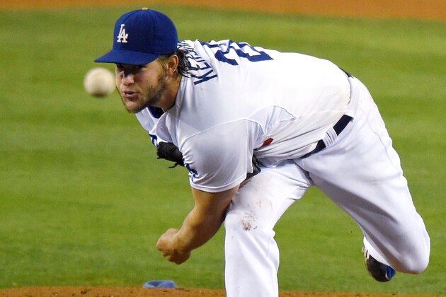 Los Angeles Dodgers starting pitcher Clayton Kershaw throws to the plate during the fourth inning of a baseball game against the Washington Nationals, Tuesday, Sept. 2, 2014, in Los Angeles. (AP Photo/Mark J. Terrill)
