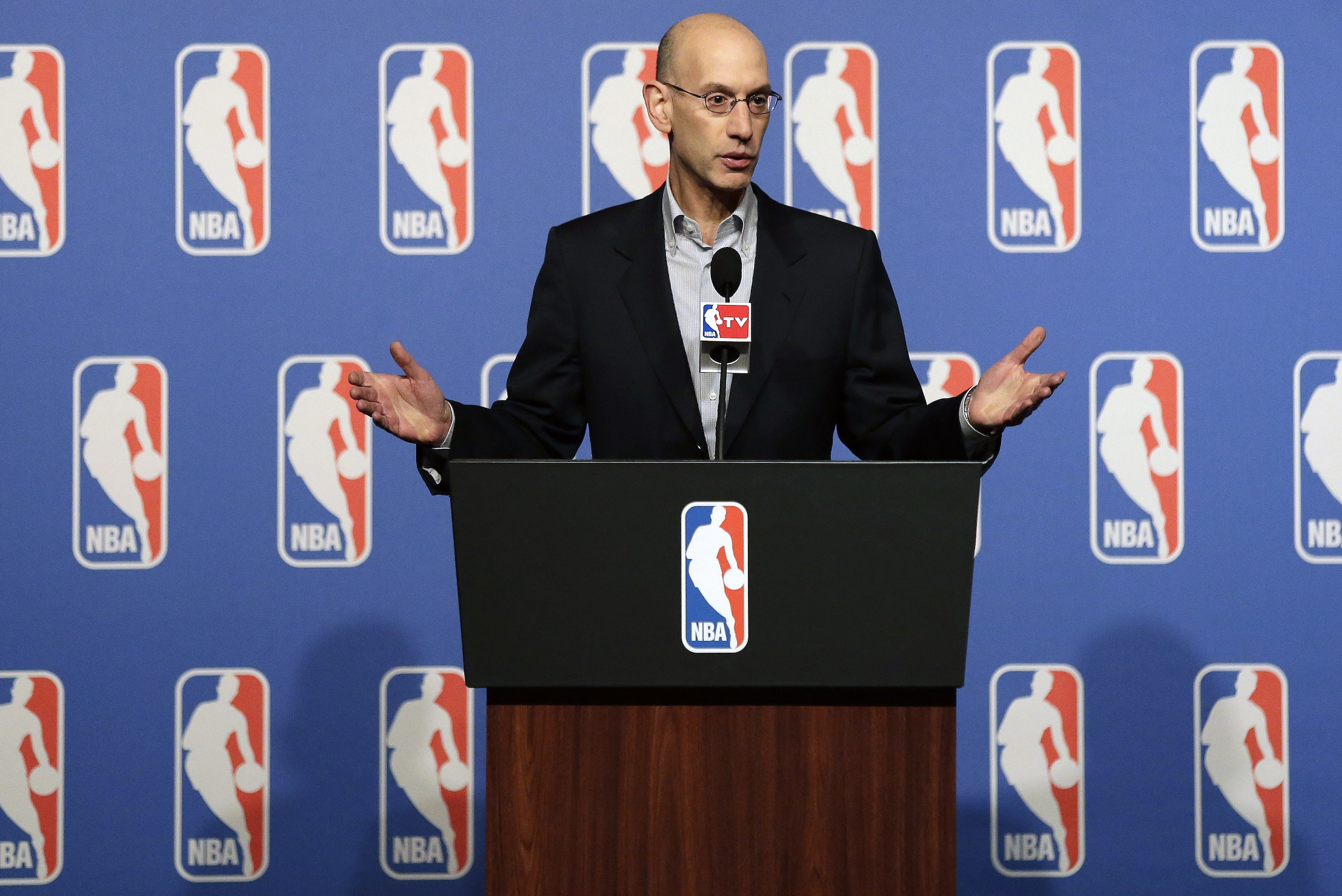 NBA Commissioner Adam Silver speaks at a news conference during the NBA board of governors meeting Tuesday, July 15, 2014, in Las Vegas. (AP Photo/John Locher)