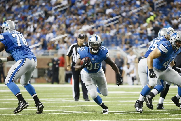 Detroit Lions running back Joique Bell (35) runs the bases against the Jacksonville Jaguars during a preseason NFL football game at Ford Field in Detroit, Friday, Aug. 22, 2014. (AP Photo/Rick Osentoski)
