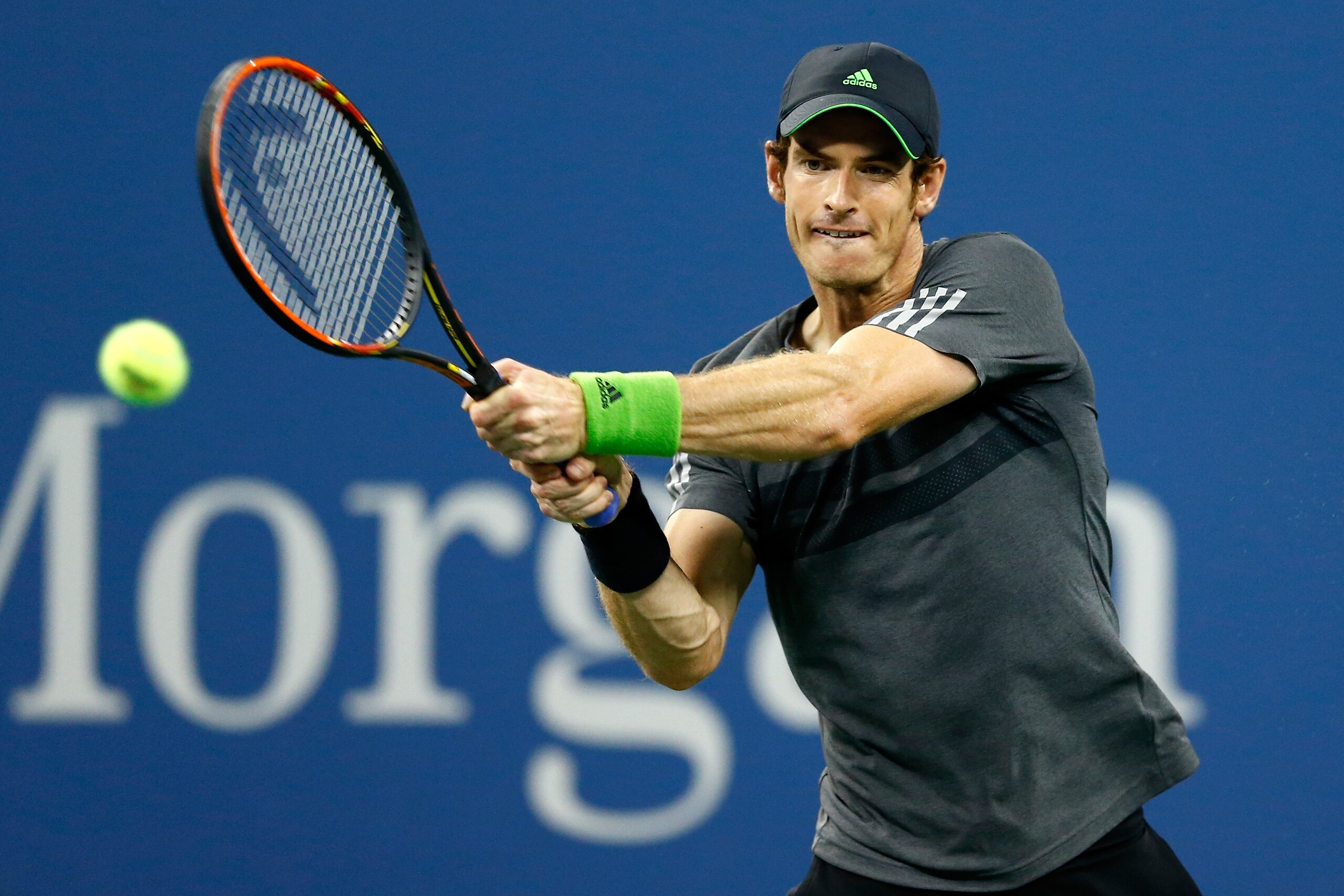 NEW YORK, NY - SEPTEMBER 03:  Andy Murray of Great Britain returns a shot to Novak Djokovic of Serbia during their men's singles quarterfinal match on Day Ten of the 2014 US Open at the USTA Billie Jean King National Tennis Center on September 3, 2014 in the Flushing neighborhood of the Queens borough of New York City.  (Photo by Julian Finney/Getty Images)