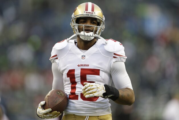 San Francisco 49ers' Michael Crabtree warms up before the NFL football NFC Championship game against the Seattle Seahawks  Sunday, Jan. 19, 2014, in Seattle. (AP Photo/Marcio Jose Sanchez)