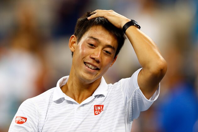 NEW YORK, NY - SEPTEMBER 03:  Kei Nishikori of Japan celebrates after defeating Stan Wawrinka of Switzerland in their men's singles quarterfinal match on Day Ten of the 2014 US Open at the USTA Billie Jean King National Tennis Center on September 3, 2014 in the Flushing neighborhood of the Queens borough of New York City. Nishikori defeated Wawrinka in five sets 3-6, 7-5, 7-6, 6-7, 6-4.  (Photo by Julian Finney/Getty Images)