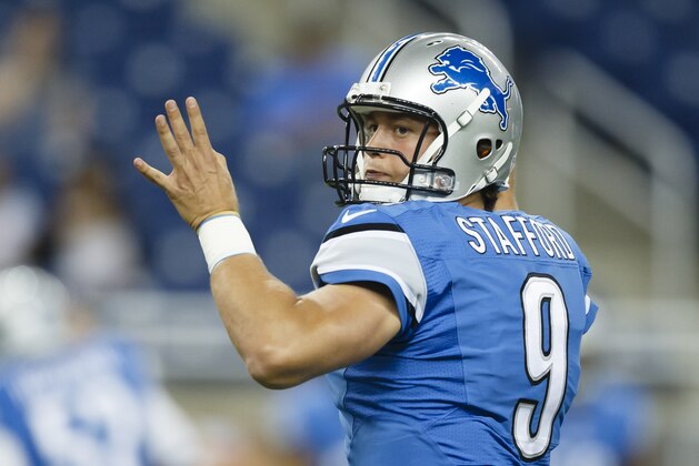 Detroit Lions quarterback Matthew Stafford (9) warms up before a preseason NFL football game against the Jacksonville Jaguars at Ford Field in Detroit, Friday, Aug. 22, 2014. (AP Photo/Rick Osentoski)