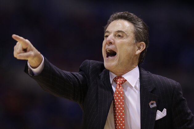 Louisville head coach Rick Pitino yells during the second half of an NCAA Midwest Regional semifinal college basketball tournament game against the Kentucky Friday, March 28, 2014, in Indianapolis. (AP Photo/Michael Conroy)