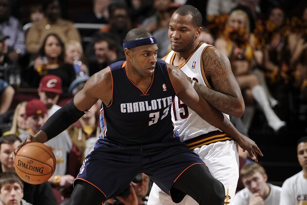 CLEVELAND, OH - FEBRUARY 6:  Brendan Haywood #33 of the Charlotte Bobcats makes a move for the basket against Marreese Speights #15 of the Cleveland Cavaliers at The Quicken Loans Arena on February 6, 2013 in Cleveland, Ohio. NOTE TO USER: User expressly acknowledges and agrees that, by downloading and/or using this Photograph, user is consenting to the terms and conditions of the Getty Images License Agreement. Mandatory Copyright Notice: Copyright 2013 NBAE (Photo by David Liam Kyle/NBAE via Getty Images)