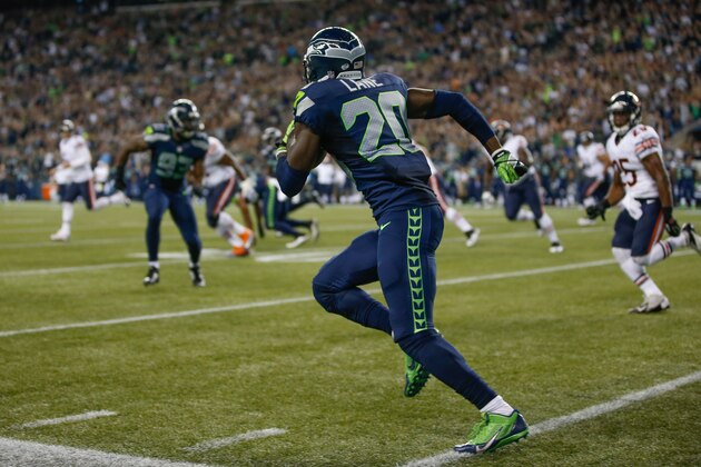 SEATTLE, WA - AUGUST 22:  Cornerback Jeremy Lane #20 of the Seattle Seahawks returns an interception in the second quarter against the Chicago Bears at CenturyLink Field on August 22, 2014 in Seattle, Washington.  (Photo by Otto Greule Jr/Getty Images)
